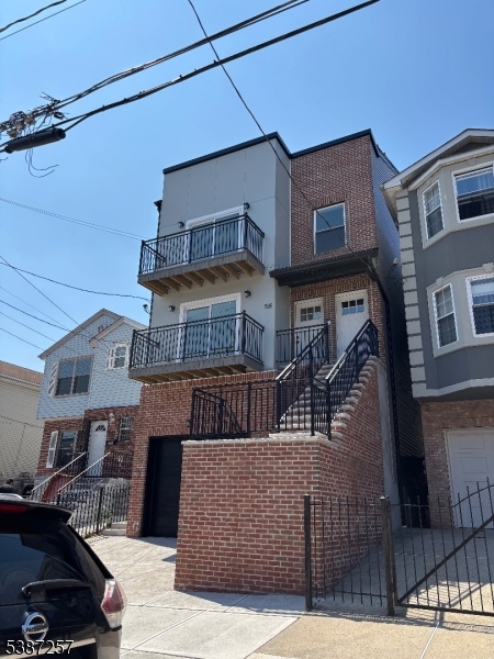 715 South 17th Street, Unit 2 Newark, NJ 07103 - Photo 23 of 24 a front view of a house with glass windows
