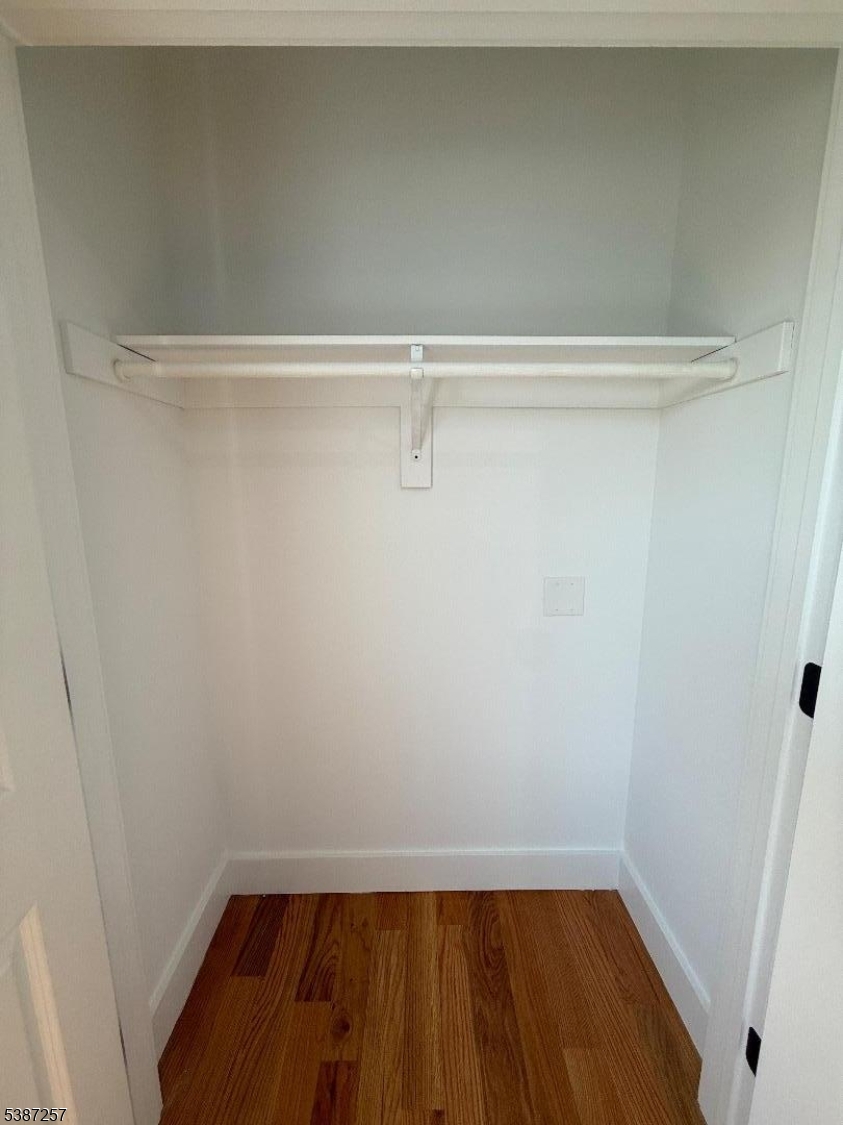 715 South 17th Street, Unit 2 Newark, NJ 07103 - Photo 8 of 24 a view of a room with wooden floor