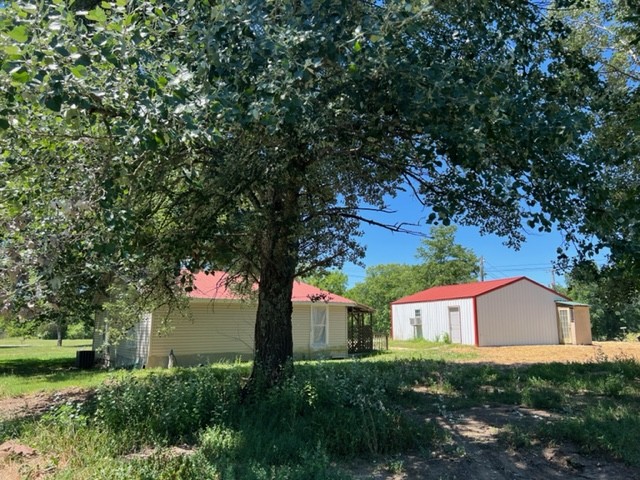 4909 Kedron Road Columbia, TN 38401 - Photo 1 of 13 a view of a tree in front of a house with a tree