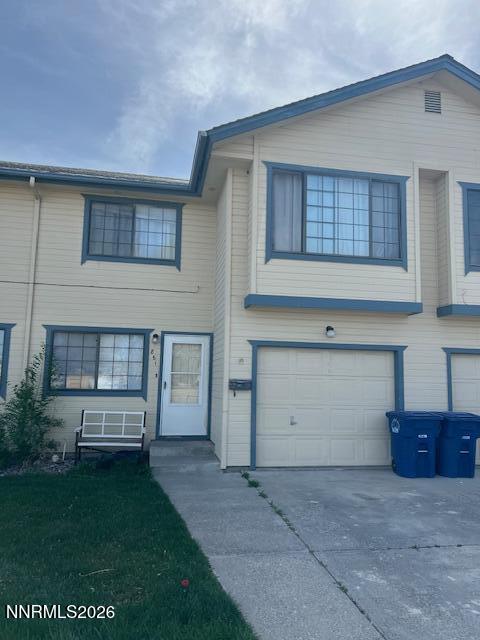 a view of a house with a back yard