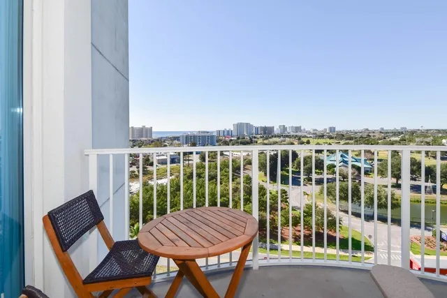 a view of a balcony with chairs
