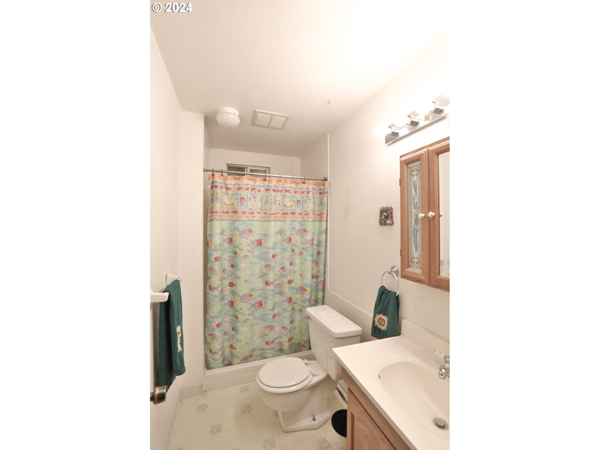 2073 Inland Way Springfield, OR 97477 - Photo 16 of 21 a bathroom with a sink toilet and shower