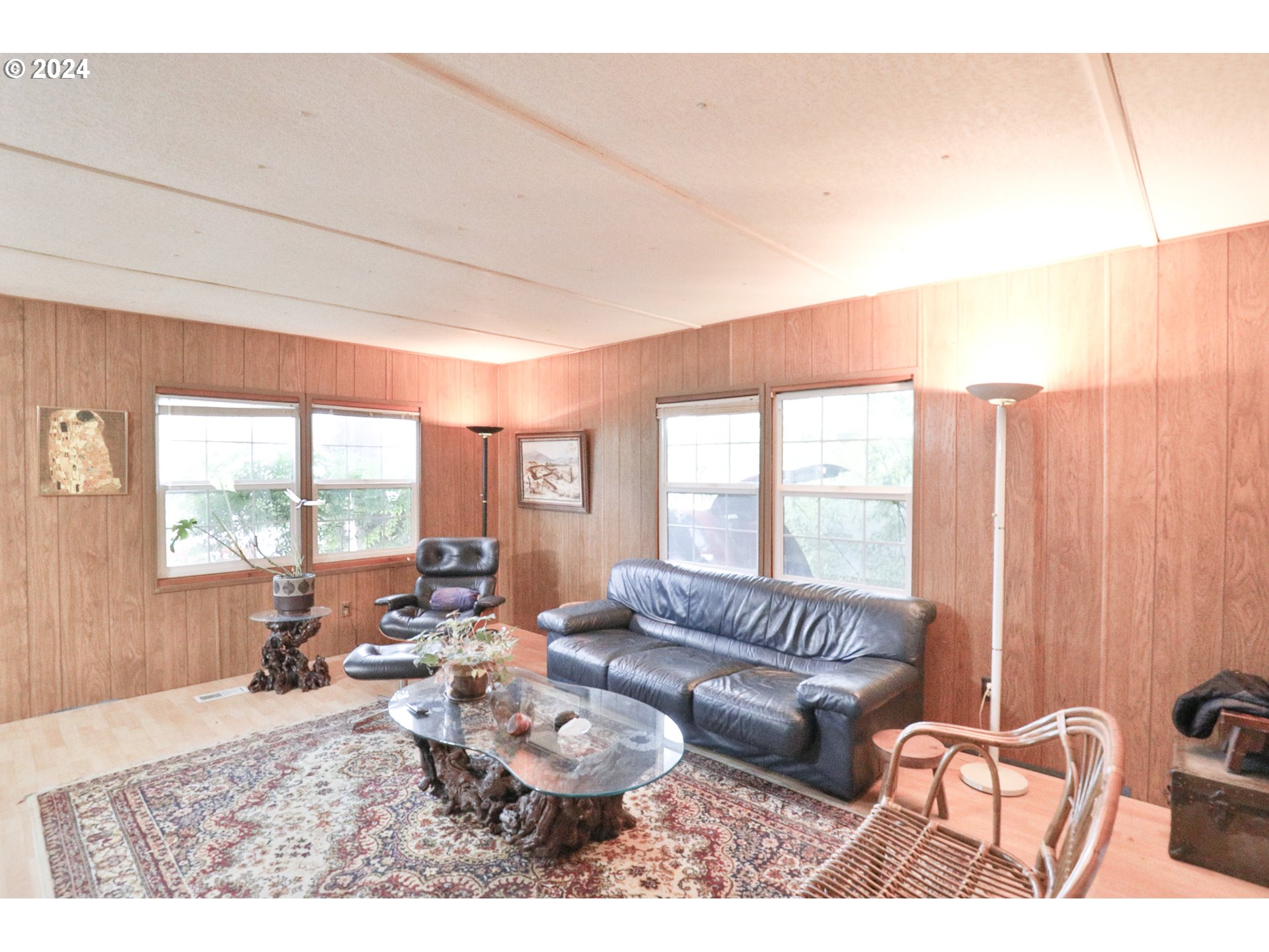 2073 Inland Way Springfield, OR 97477 - Photo 4 of 21 a living room with furniture and a large window