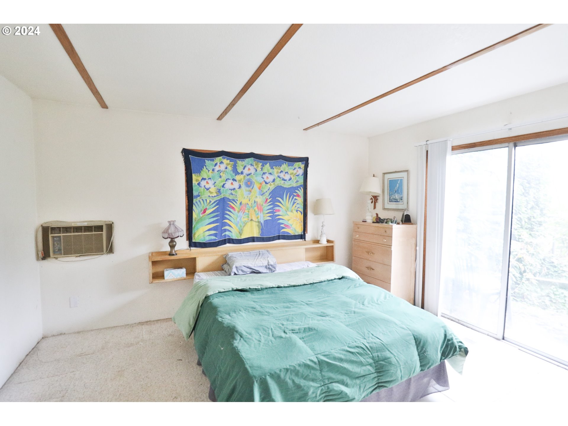 2073 Inland Way Springfield, OR 97477 - Photo 10 of 21 a bedroom with a bed and a painting on the wall