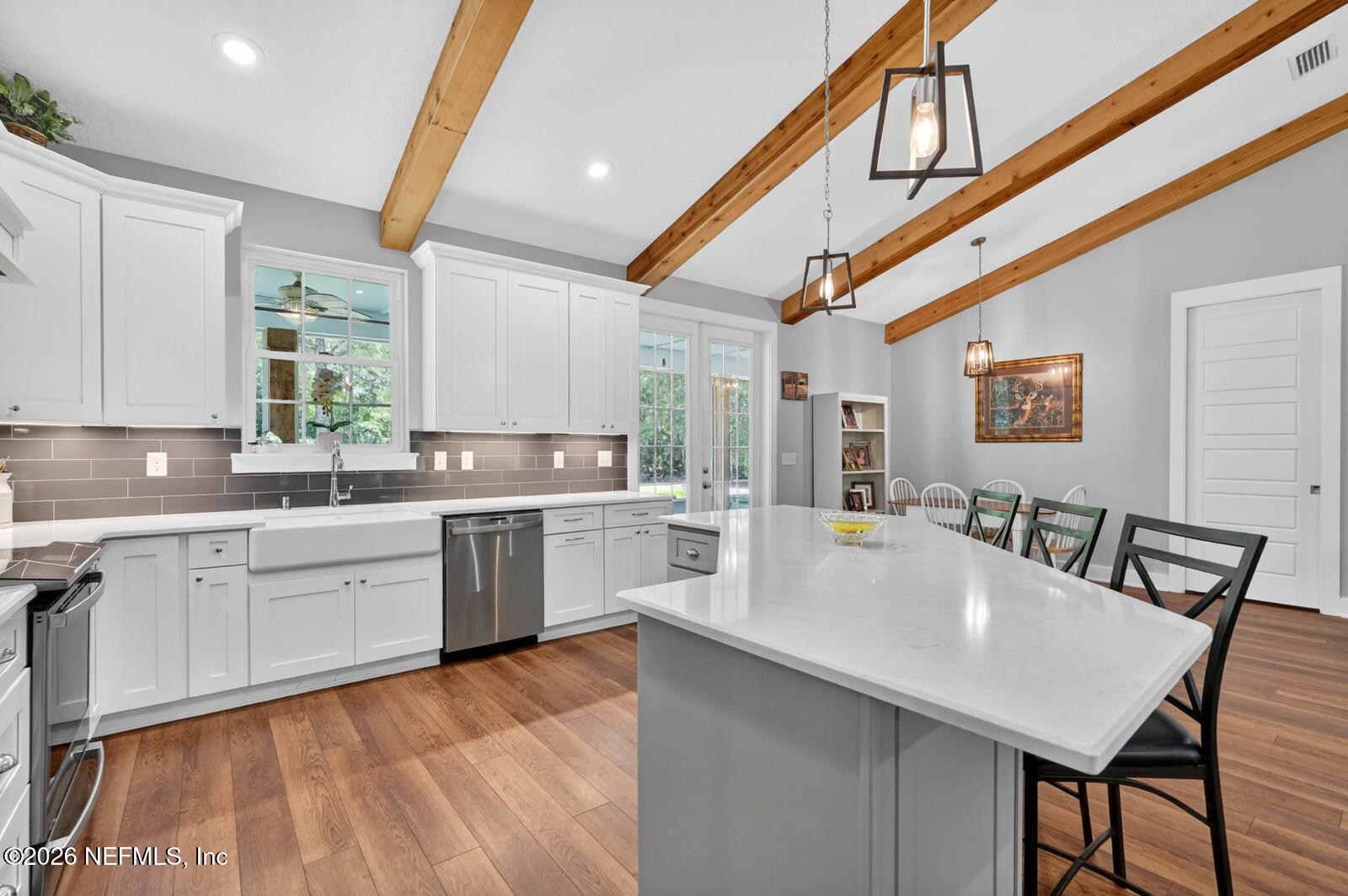 264 Peniel Church Road Palatka, FL 32177 - Photo 11 of 48 a large white kitchen with a large window