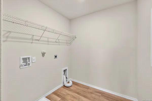 a view of small space with empty racks on the wall