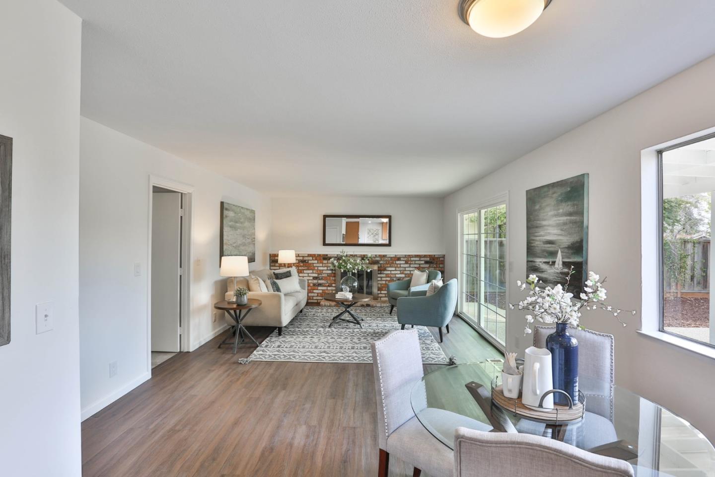 3059 Delta Road San Jose, CA 95135 - Photo 16 of 32 a living room with furniture and wooden floor