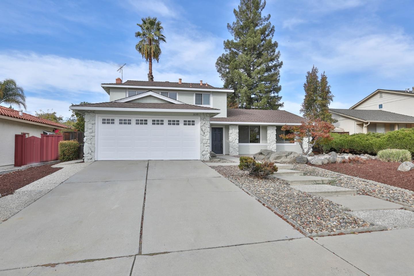 3059 Delta Road San Jose, CA 95135 - Photo 2 of 32 a view of a house with large space and a garage