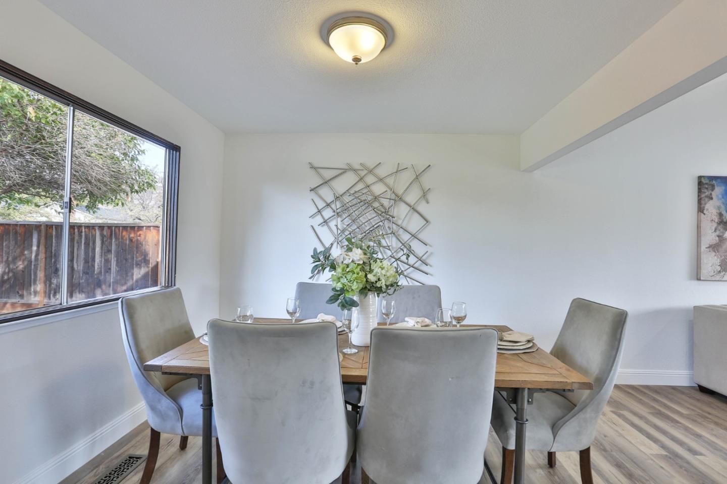 3059 Delta Road San Jose, CA 95135 - Photo 8 of 32 a view of a dining room with furniture window and outside view