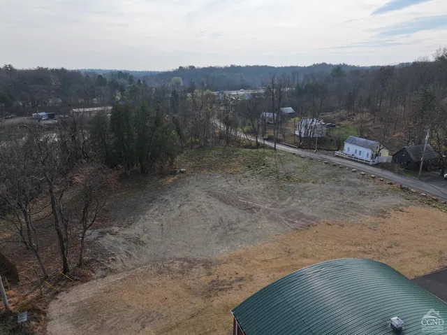 a view of roof with wooden floor