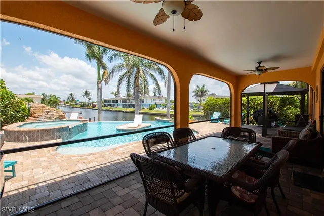 a view of swimming pool from a balcony