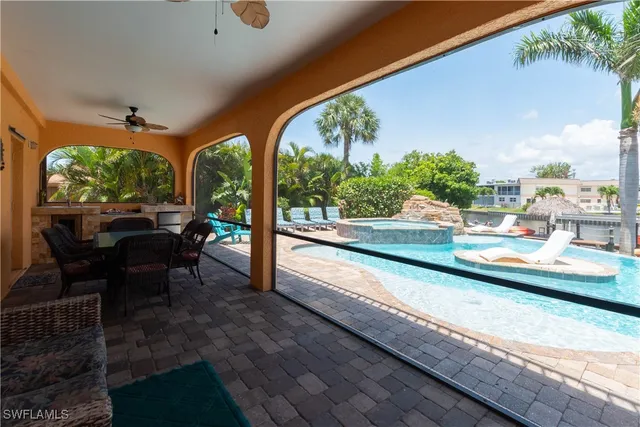 a view of swimming pool with a porch