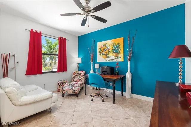 a view of entryway and hall with a living room