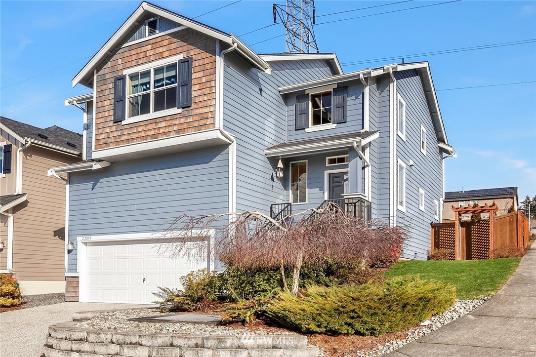 23019 42nd Drive Southeast Bothell, WA 98021 - Photo 1 of 19 a front view of a house with a yard