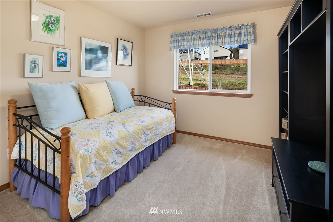23019 42nd Drive Southeast Bothell, WA 98021 - Photo 12 of 19 a bed room with a bed and a window