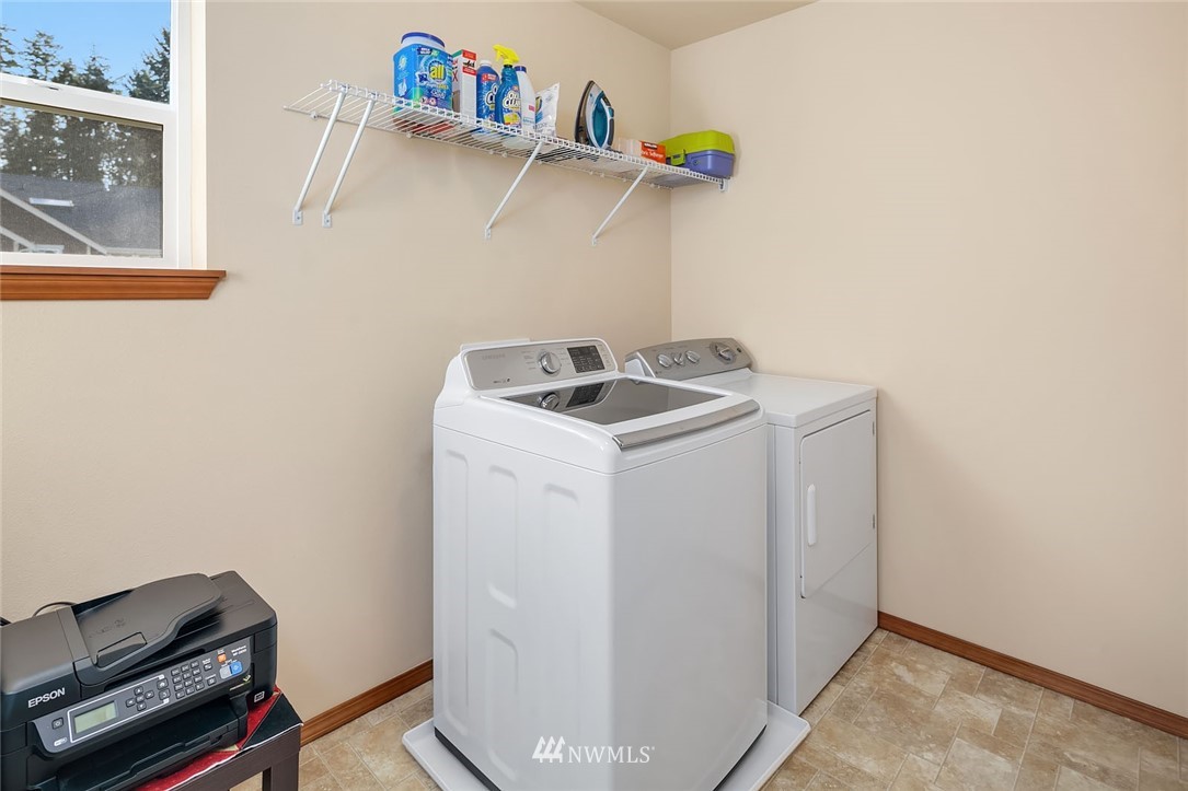 23019 42nd Drive Southeast Bothell, WA 98021 - Photo 15 of 19 a utility room with dryer and washer