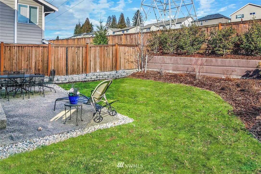 23019 42nd Drive Southeast Bothell, WA 98021 - Photo 18 of 19 a view of a backyard with a patio and a garden