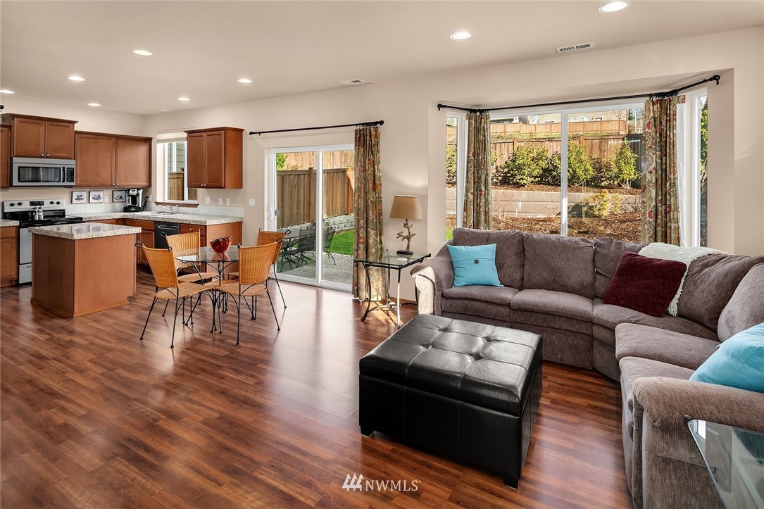 23019 42nd Drive Southeast Bothell, WA 98021 - Photo 3 of 19 a living room with furniture and a large window