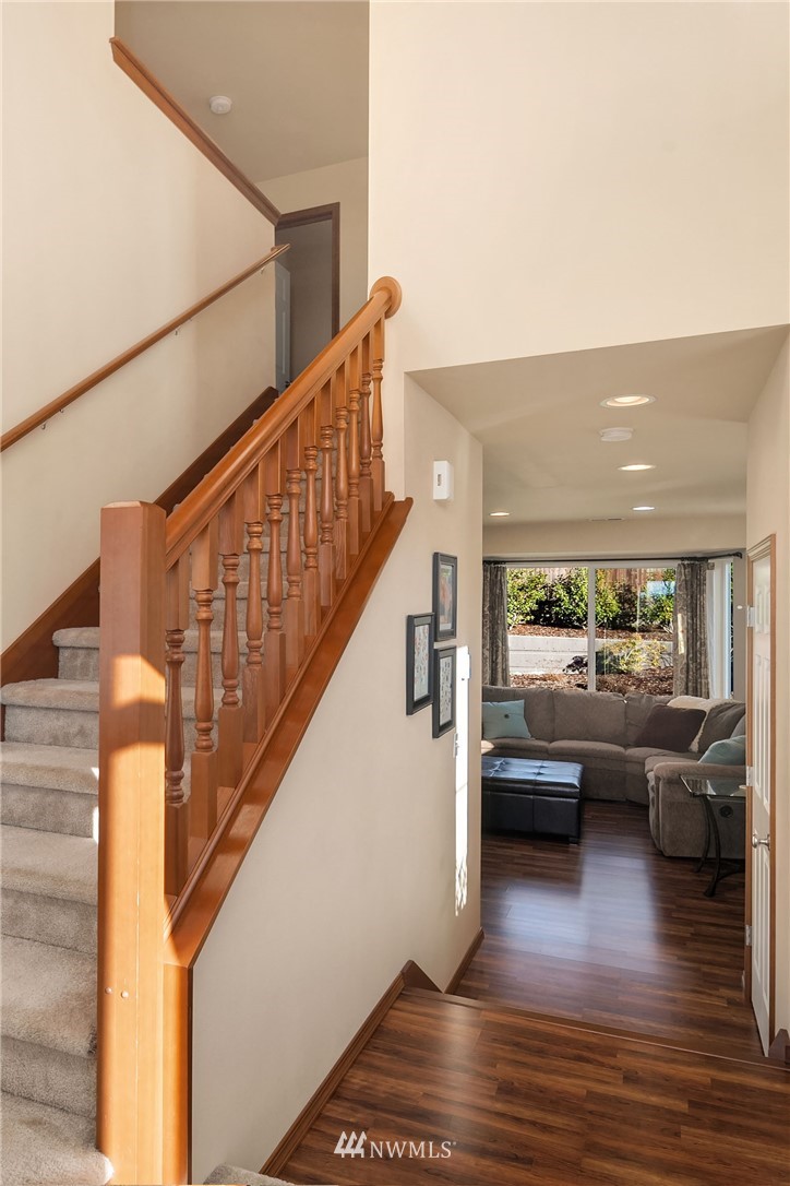 23019 42nd Drive Southeast Bothell, WA 98021 - Photo 9 of 19 a view of entryway and livingroom from stairs