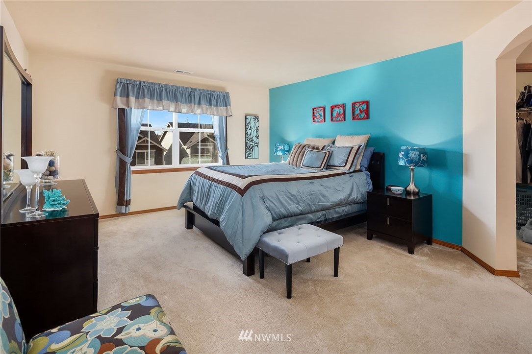 23019 42nd Drive Southeast Bothell, WA 98021 - Photo 10 of 19 a bed room with a bed and a couch
