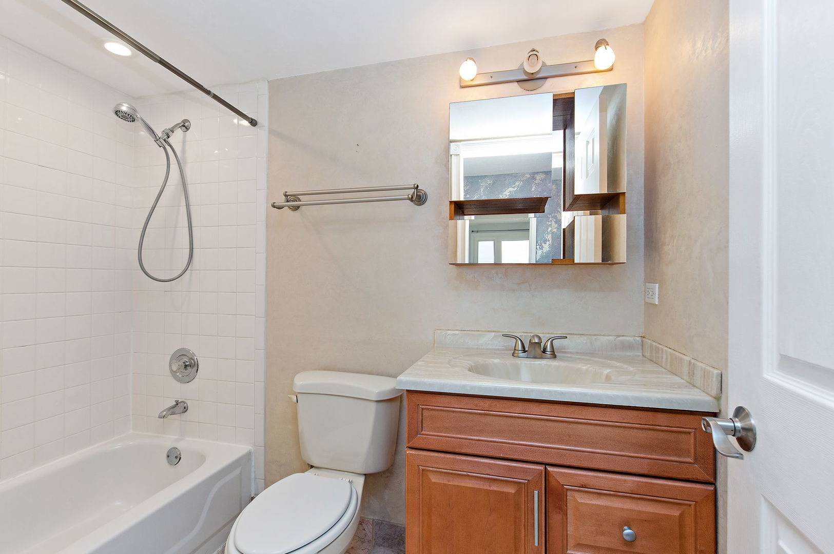 1 Renaissance Place, Unit 702 Palatine, IL 60067 - Photo 10 of 10 a bathroom with a sink toilet and shower