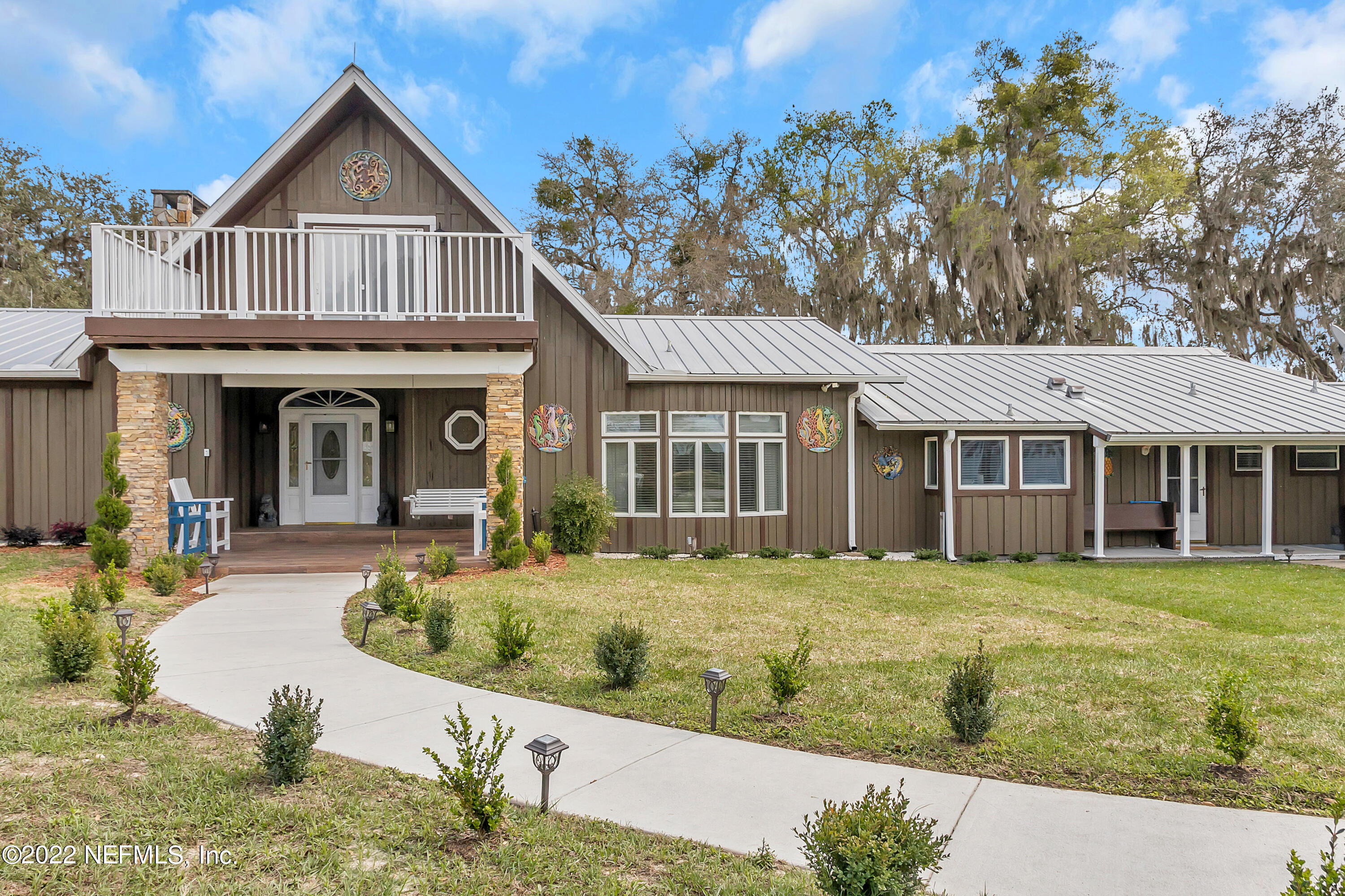 152 Marvin Jones Road Crescent City, FL 32112 - Photo 1 of 83 a front view of a house with a yard