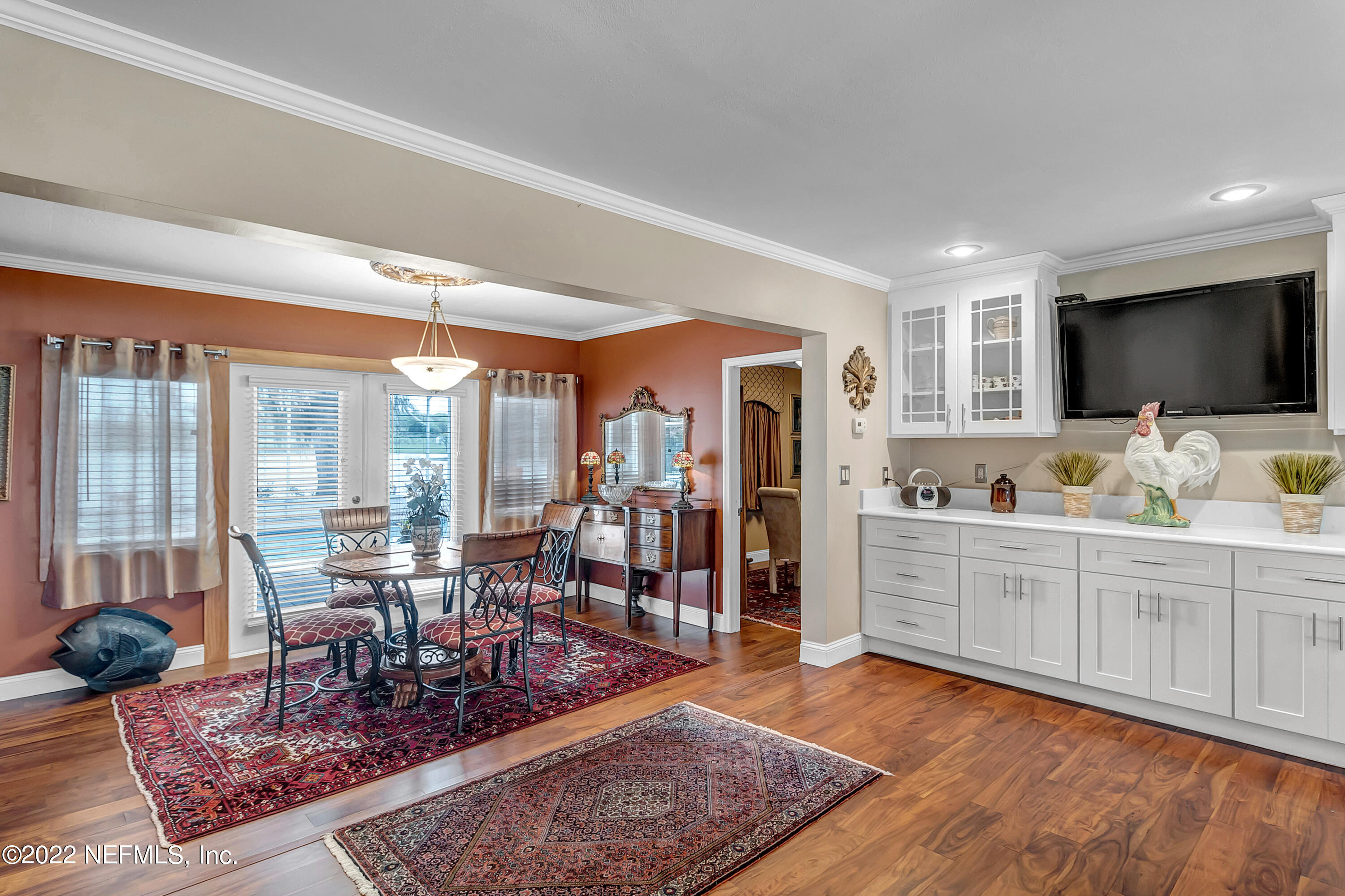 152 Marvin Jones Road Crescent City, FL 32112 - Photo 11 of 83 a living room with furniture and a flat screen tv