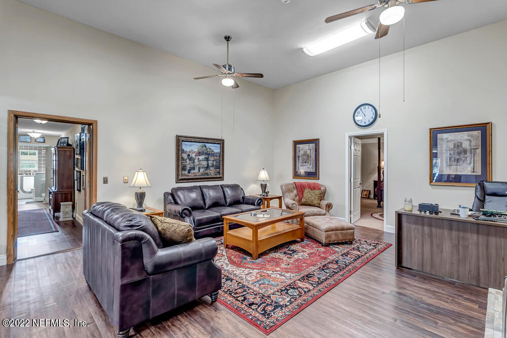 152 Marvin Jones Road Crescent City, FL 32112 - Photo 23 of 83 a living room with furniture and wooden floor