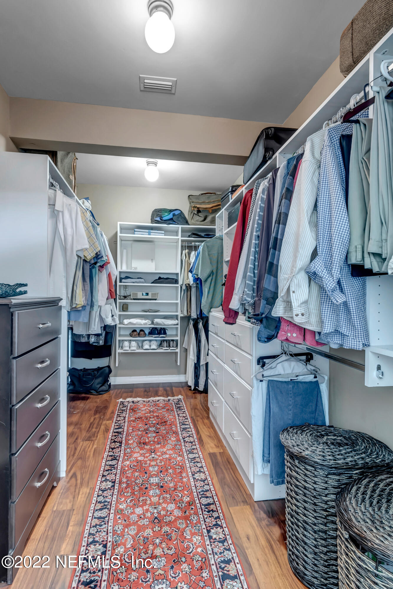152 Marvin Jones Road Crescent City, FL 32112 - Photo 26 of 83 a walk in closet with clothes and shoes