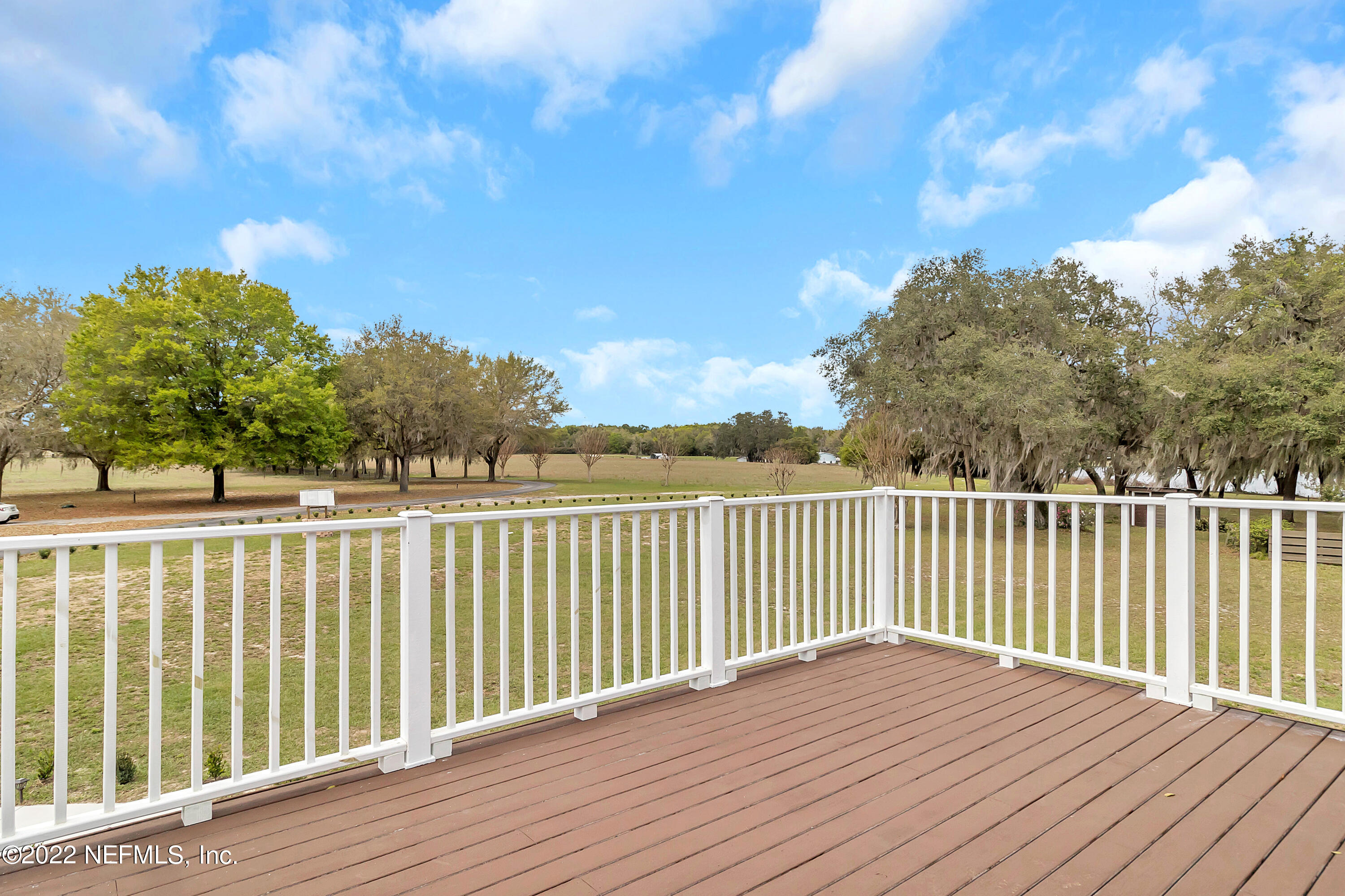 152 Marvin Jones Road Crescent City, FL 32112 - Photo 32 of 83 a view of balcony with wooden fence