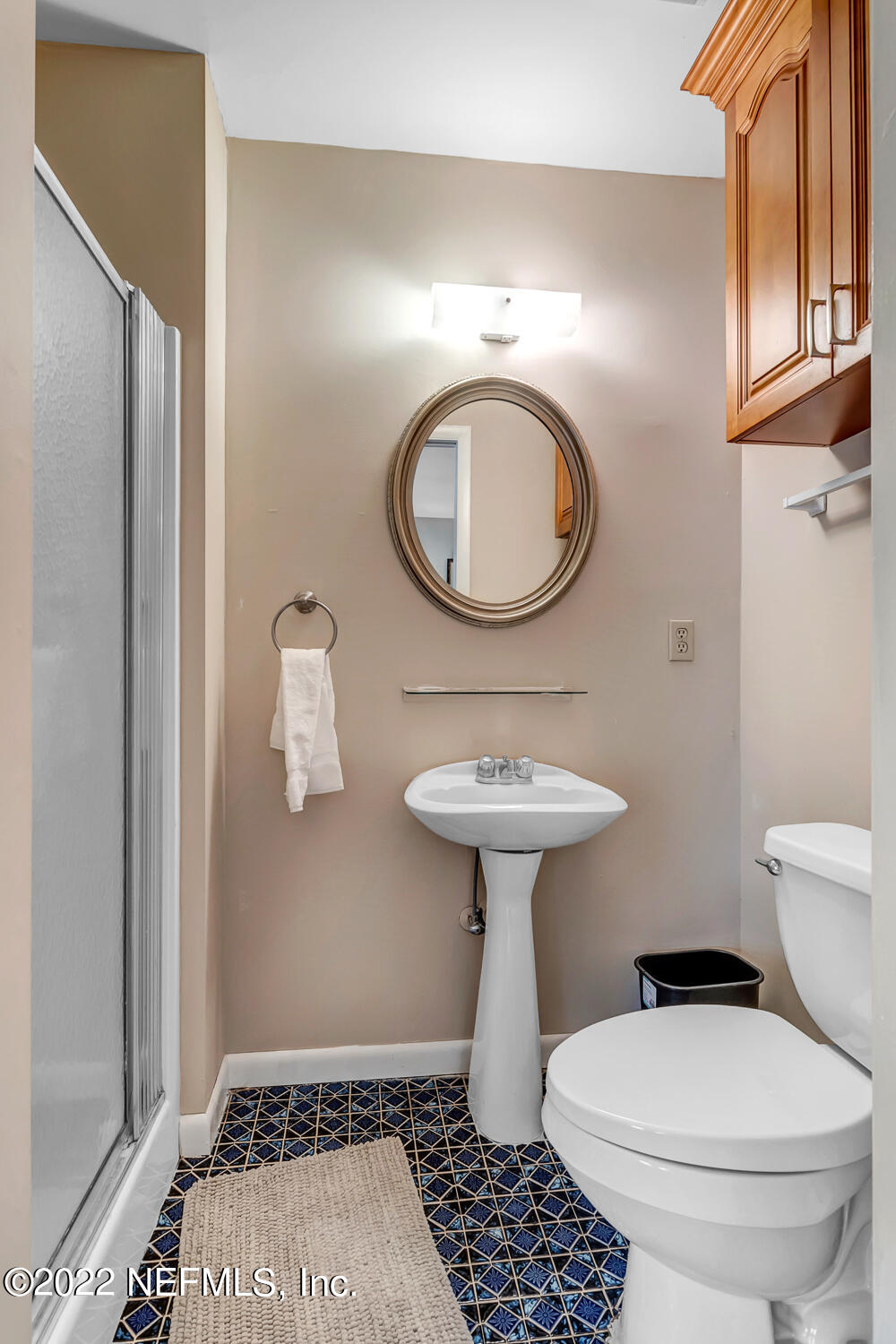 152 Marvin Jones Road Crescent City, FL 32112 - Photo 53 of 83 a bathroom with a sink toilet and a mirror