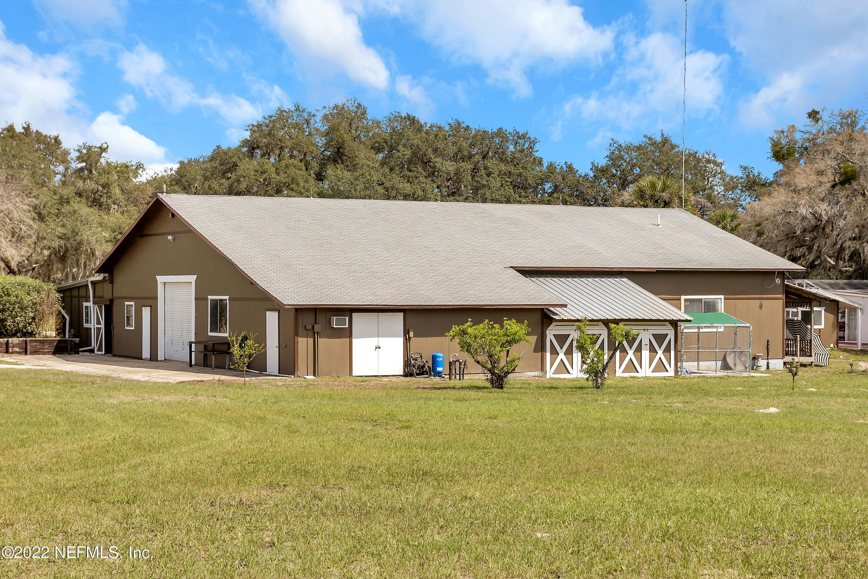 152 Marvin Jones Road Crescent City, FL 32112 - Photo 60 of 83 a front view of house with an outdoor space and seating