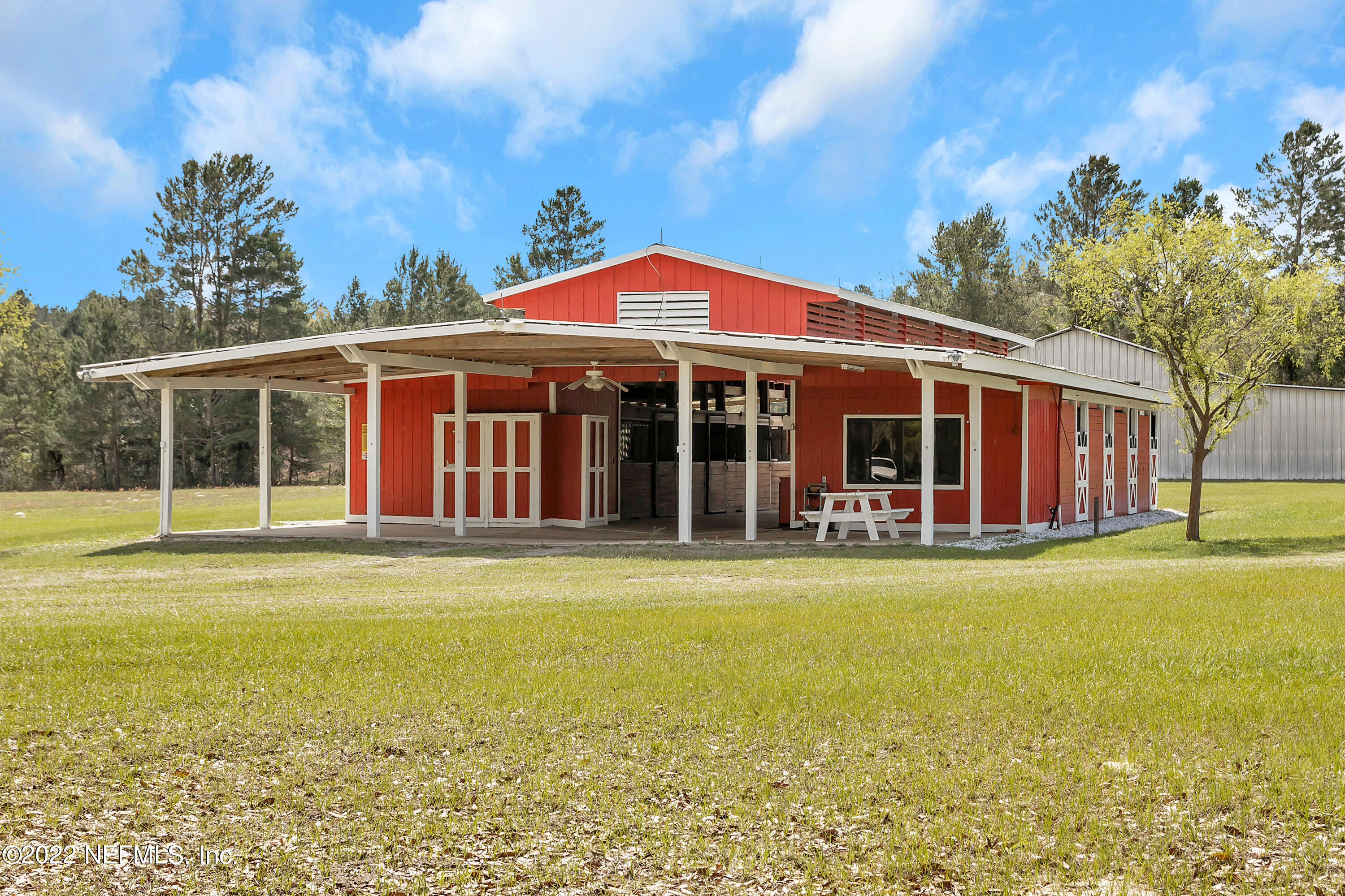 152 Marvin Jones Road Crescent City, FL 32112 - Photo 64 of 83 a view of a house with a swimming pool and outdoor space