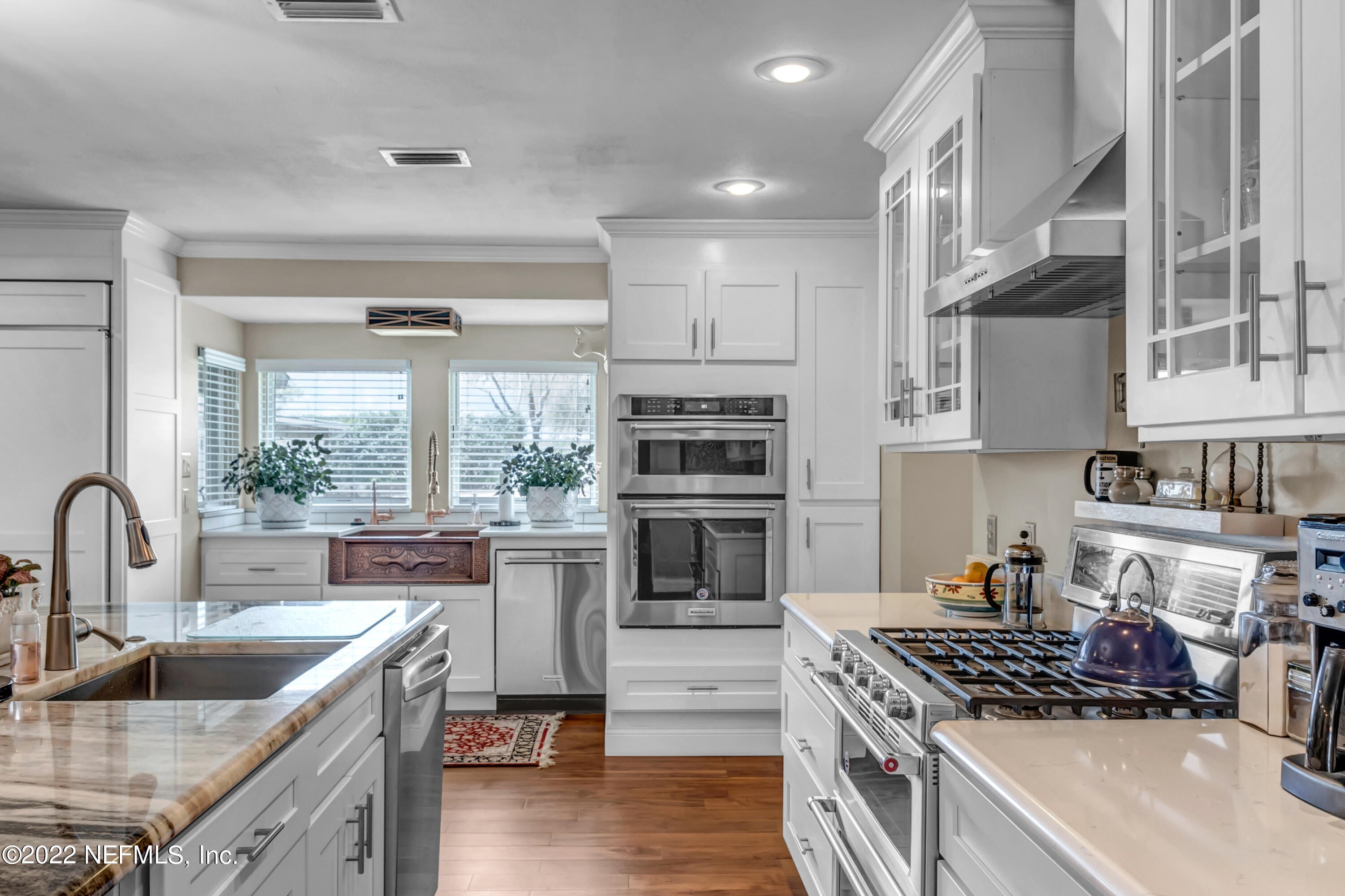 152 Marvin Jones Road Crescent City, FL 32112 - Photo 8 of 83 a kitchen with stainless steel appliances granite countertop a stove and a sink