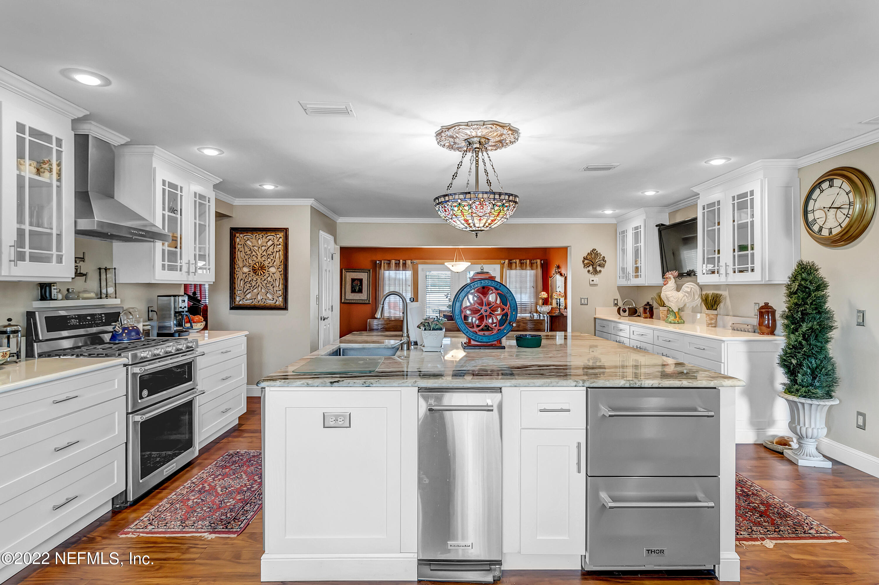 152 Marvin Jones Road Crescent City, FL 32112 - Photo 9 of 83 a kitchen with kitchen island granite countertop counter top space a sink and appliances