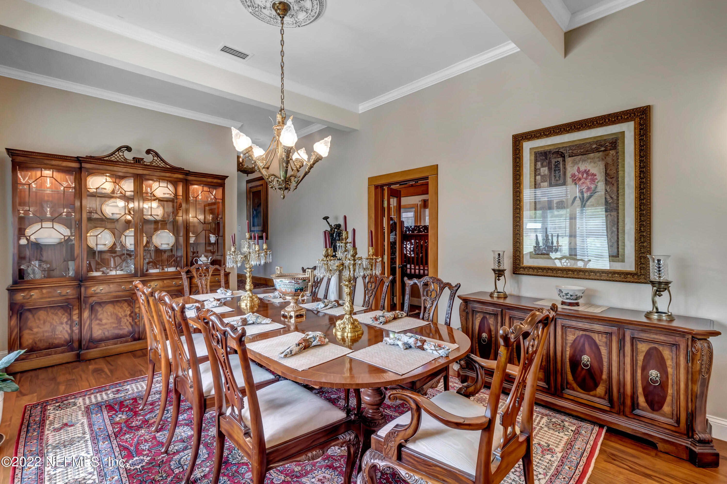 152 Marvin Jones Road Crescent City, FL 32112 - Photo 10 of 83 a view of a dining room with furniture a chandelier and wooden floor