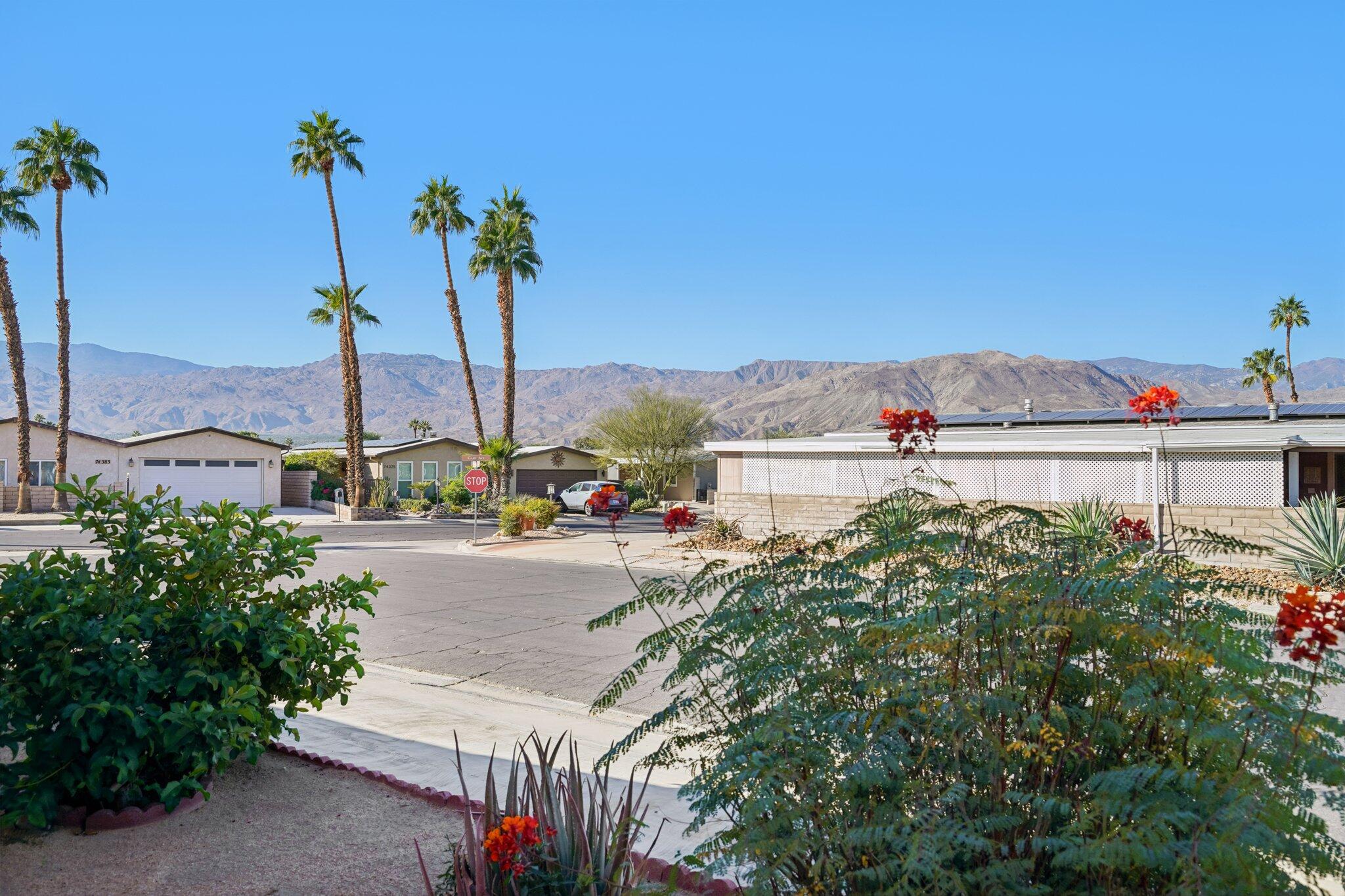 74584 Nevada Circle East Palm Desert, CA 92260 - Photo 2 of 46 a view of a city with tall buildings