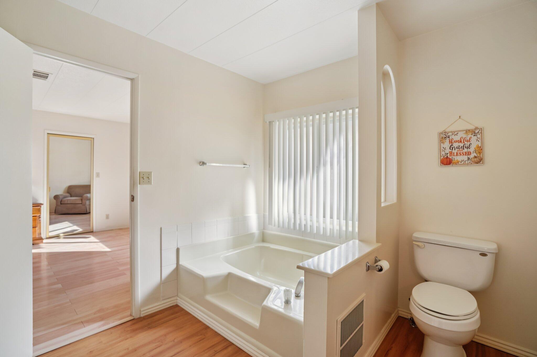 74584 Nevada Circle East Palm Desert, CA 92260 - Photo 25 of 46 a bathroom with a sink toilet and shower