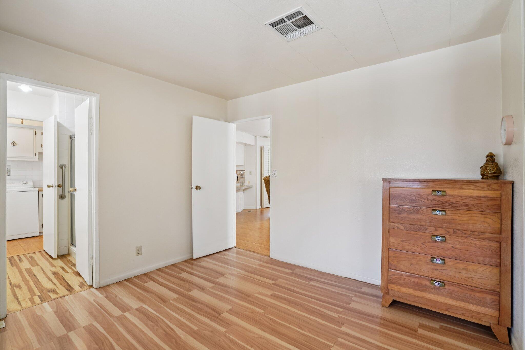 74584 Nevada Circle East Palm Desert, CA 92260 - Photo 28 of 46 a view of room with wooden floor