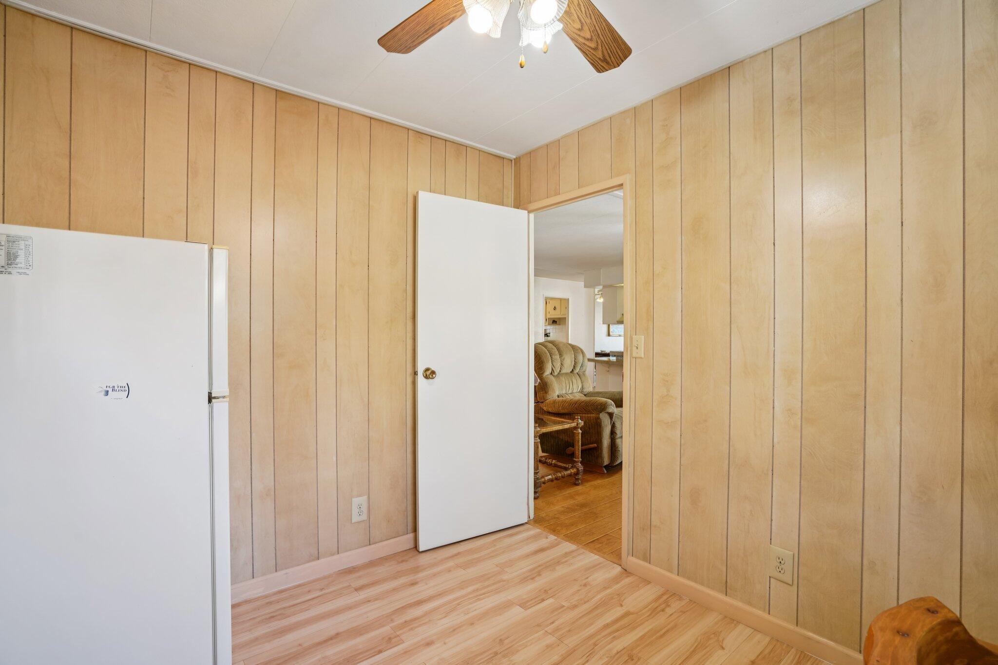 74584 Nevada Circle East Palm Desert, CA 92260 - Photo 32 of 46 a view of a hallway with wooden floor