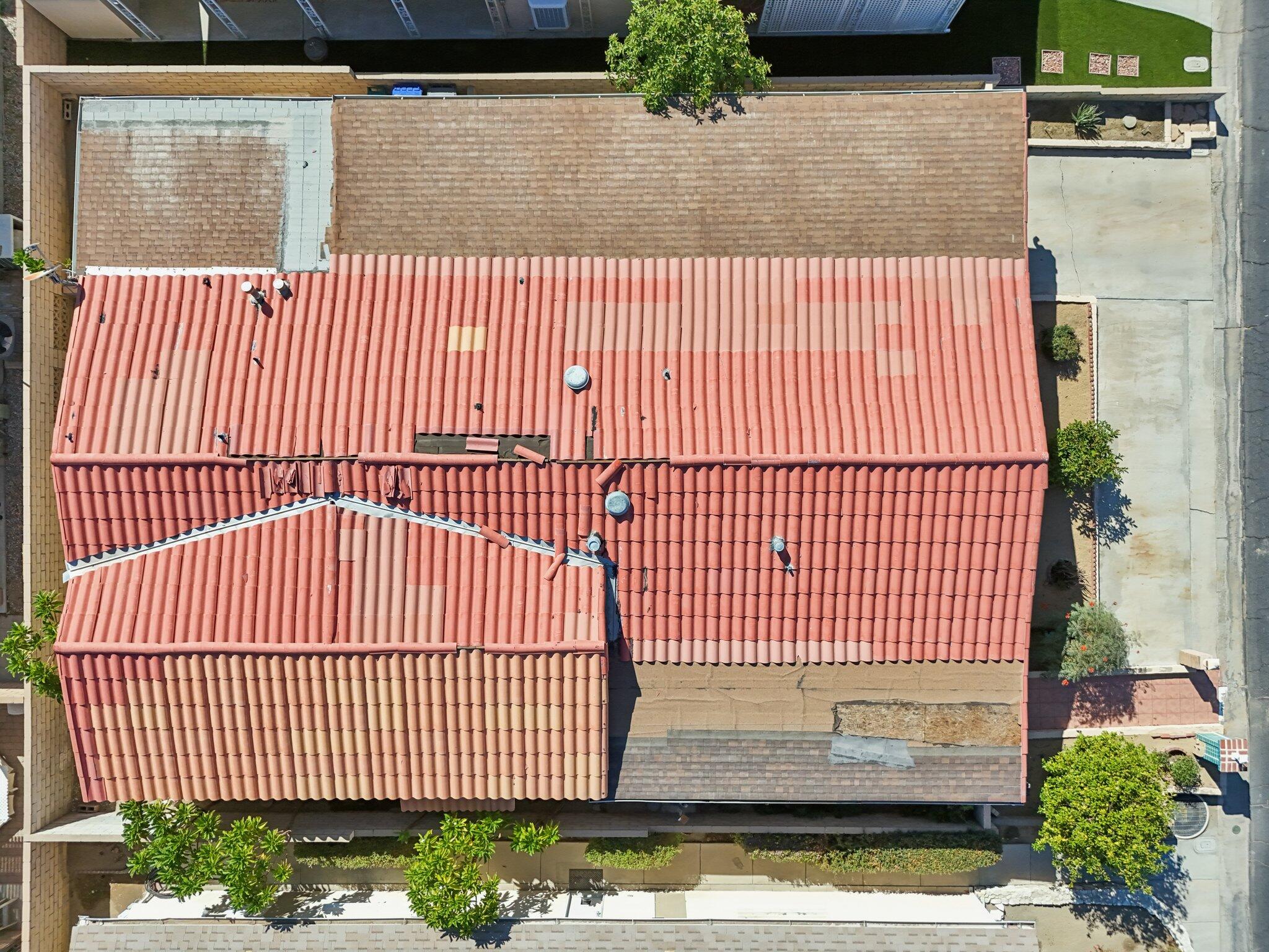 74584 Nevada Circle East Palm Desert, CA 92260 - Photo 40 of 46 a view of a brick house with a street