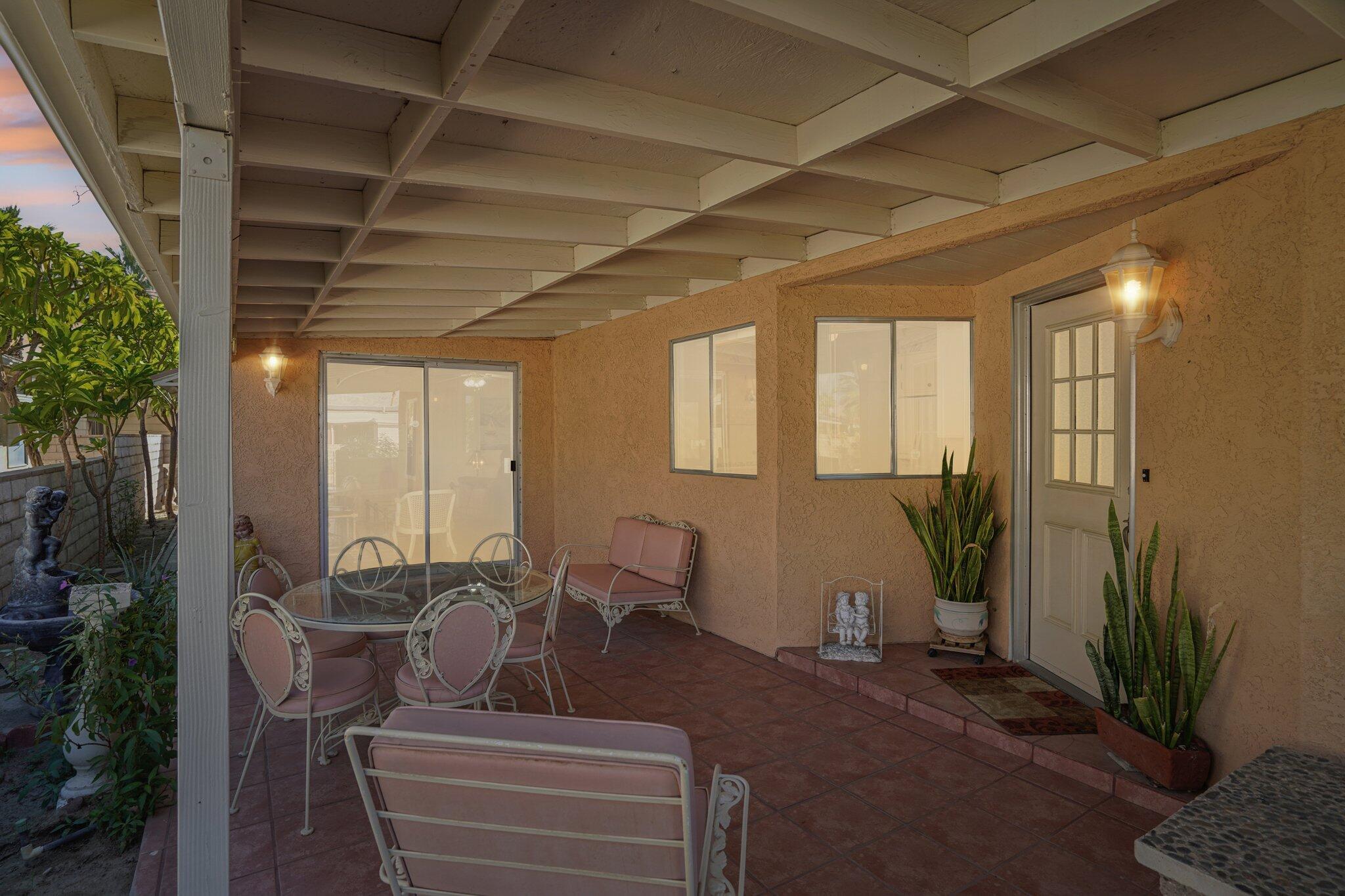 74584 Nevada Circle East Palm Desert, CA 92260 - Photo 41 of 46 a view of an outdoor space with seating area