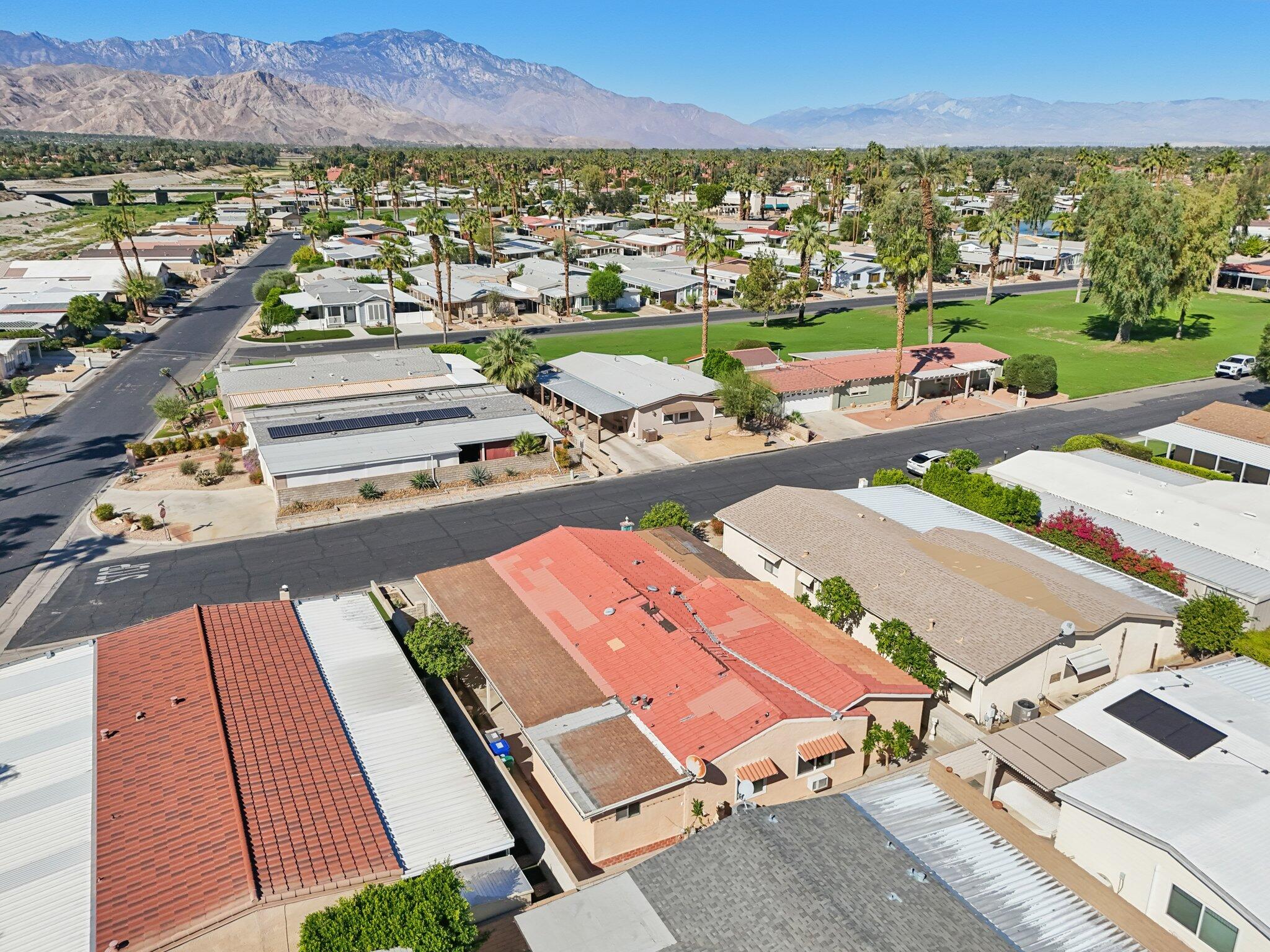 74584 Nevada Circle East Palm Desert, CA 92260 - Photo 44 of 46 an aerial view of a city with lounge chairs