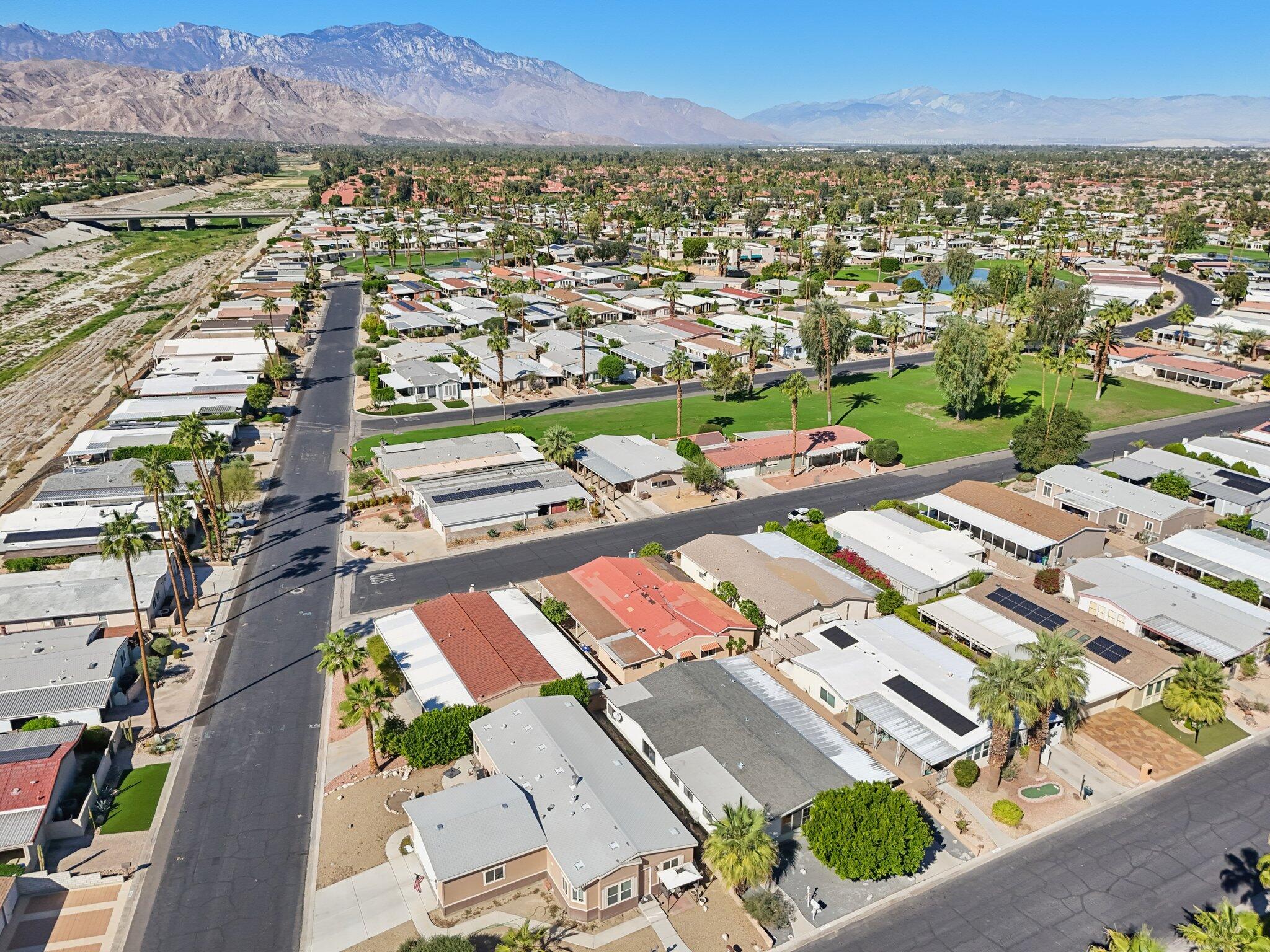 74584 Nevada Circle East Palm Desert, CA 92260 - Photo 45 of 46 an aerial view of a city with lots of residential buildings