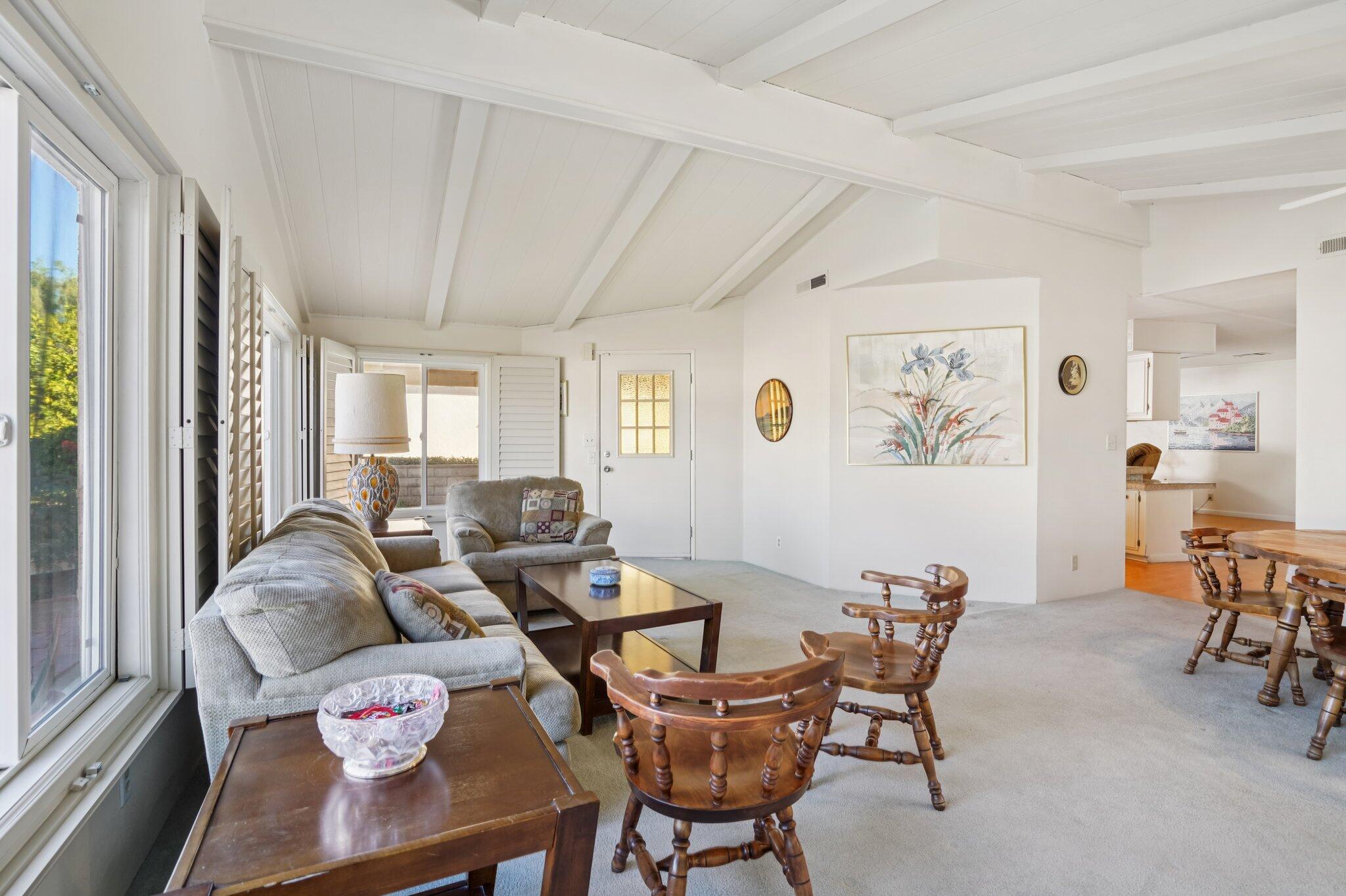 74584 Nevada Circle East Palm Desert, CA 92260 - Photo 10 of 46 a living room with furniture and a large window