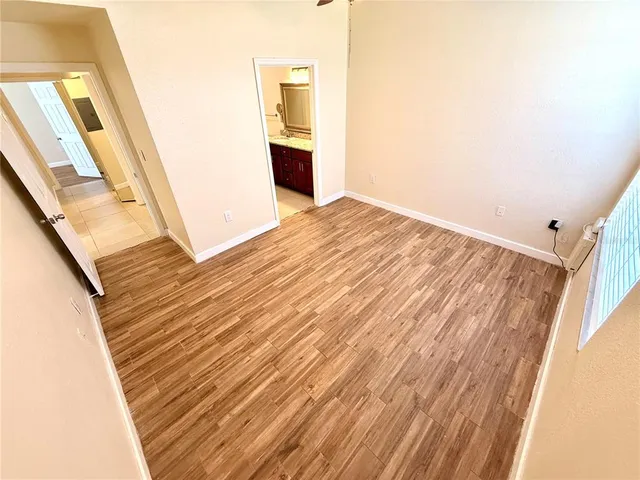 a kitchen with a sink and a stove