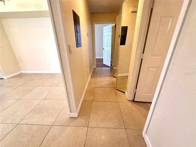 a view of wooden floor and a window