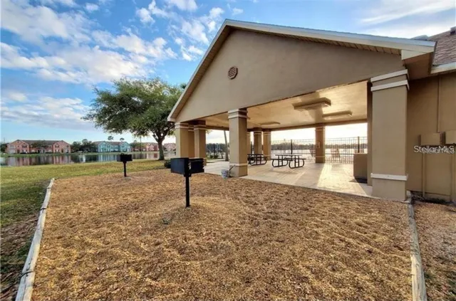 a view of a street with a yard