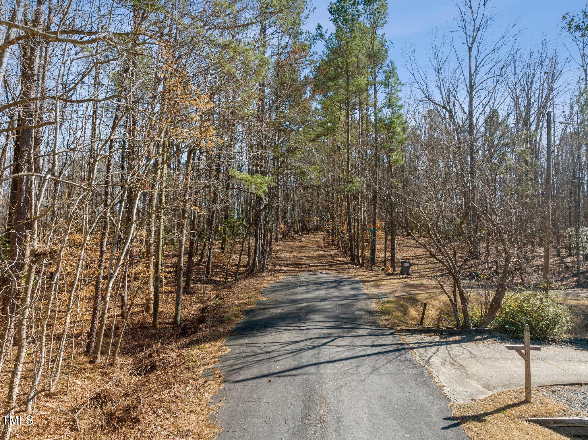 0 Oldham Lake Road Sanford, NC 27330 - Photo 12 of 12 a view of a yard with large trees