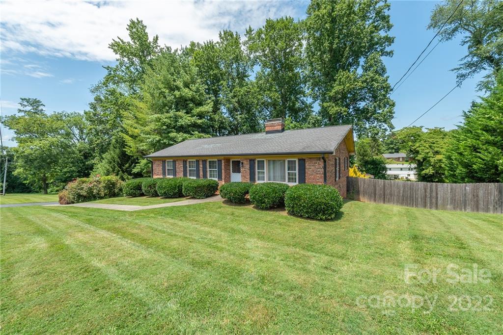 62 Round Top Road Asheville, NC 28803 - Photo 2 of 46 a view of a house with a yard and plants